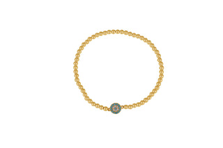 Small eye beaded light blue bracelet in gold