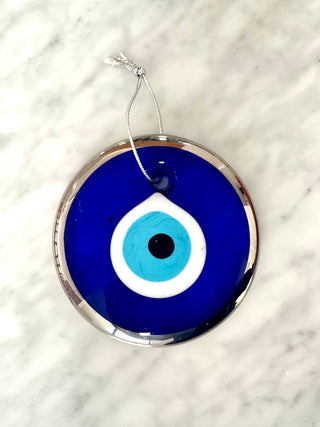 Glass eye ornament in silver